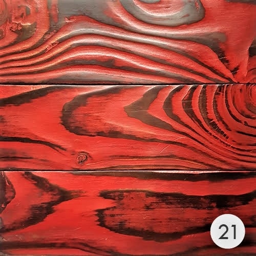 Image of red on black distressed wood
