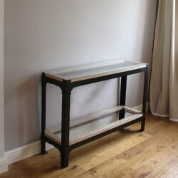 Ironfire console table with oak framed glass topped shelf