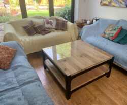 Ironfire's Oak Coffee Table with a glass top