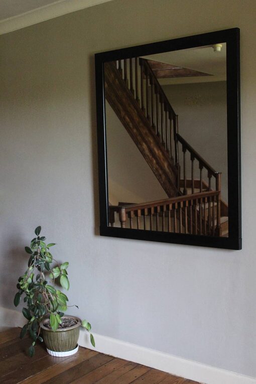 Large hung mirror in steel frame