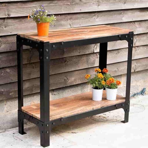 Orange tinted wooden console with black industrial framing