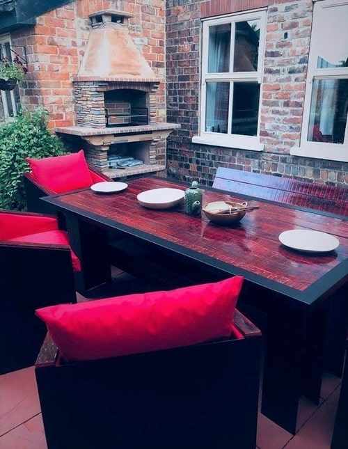 Red Table By Pizza Oven