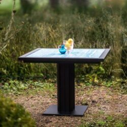 Ironfire Blue Bistro Table in the garden